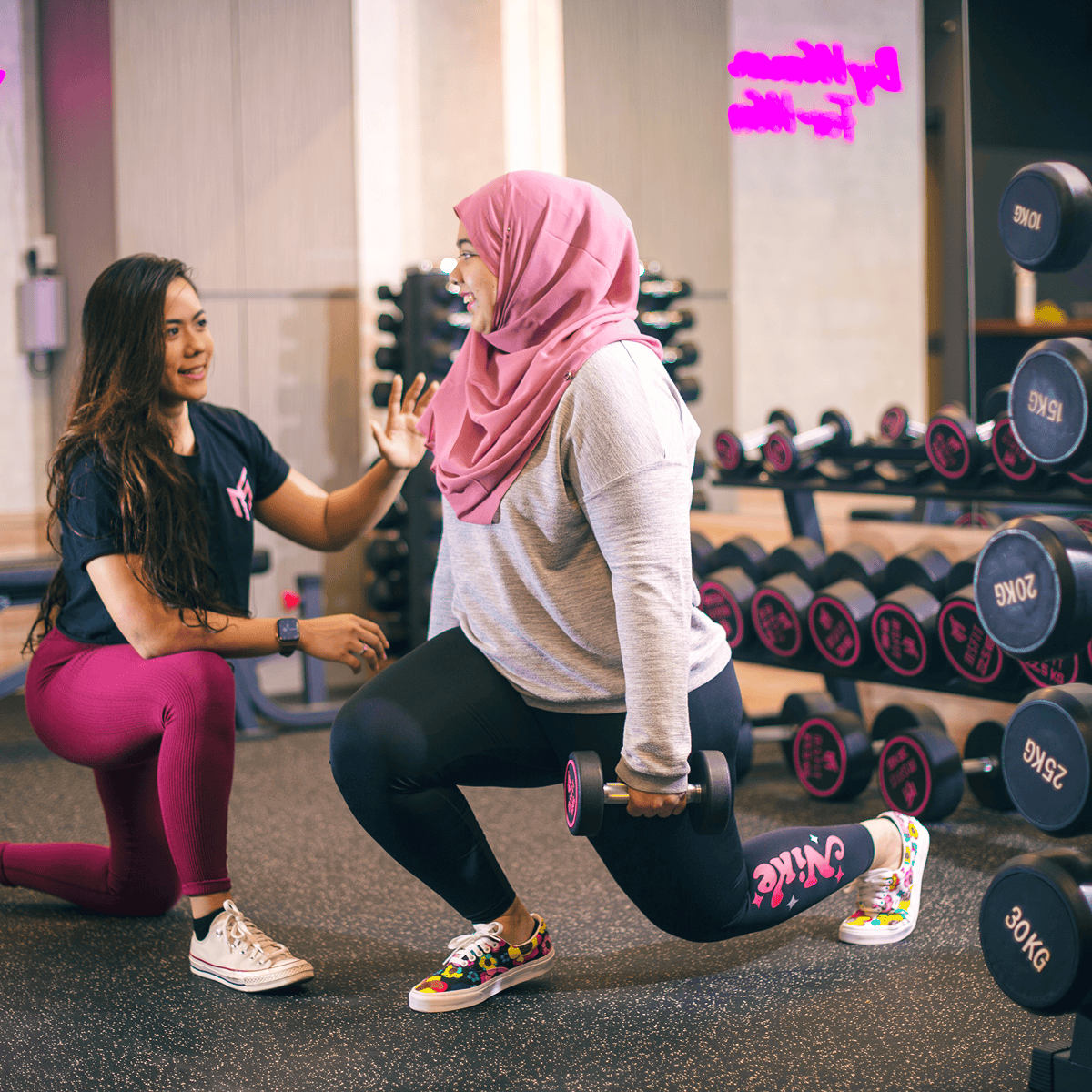 MSFIT coach guiding a member