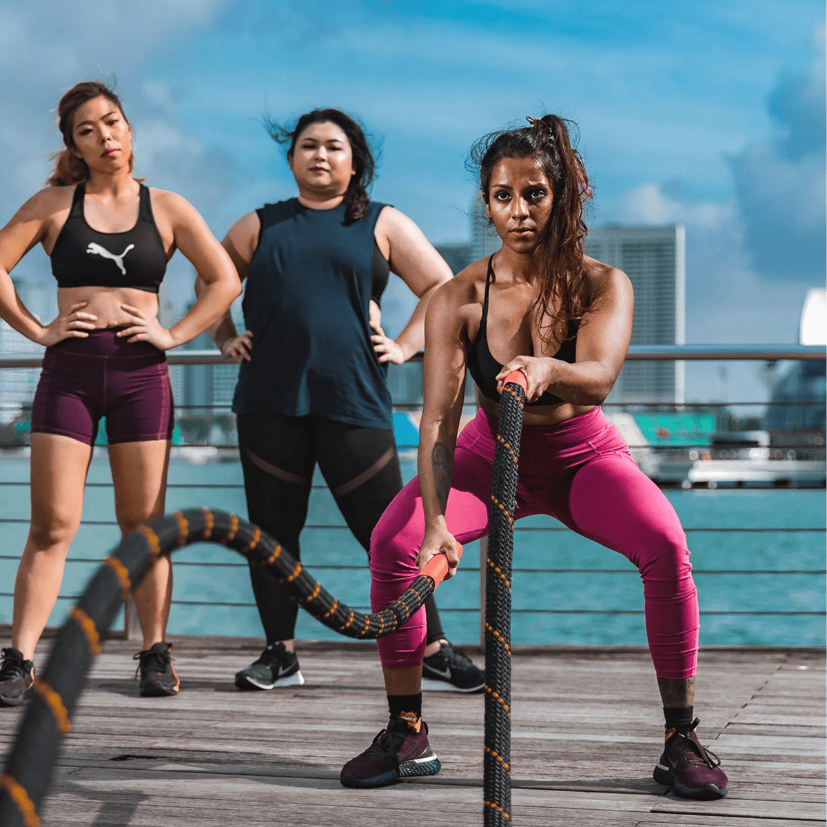 MSFIT members doing battle ropes outdoors